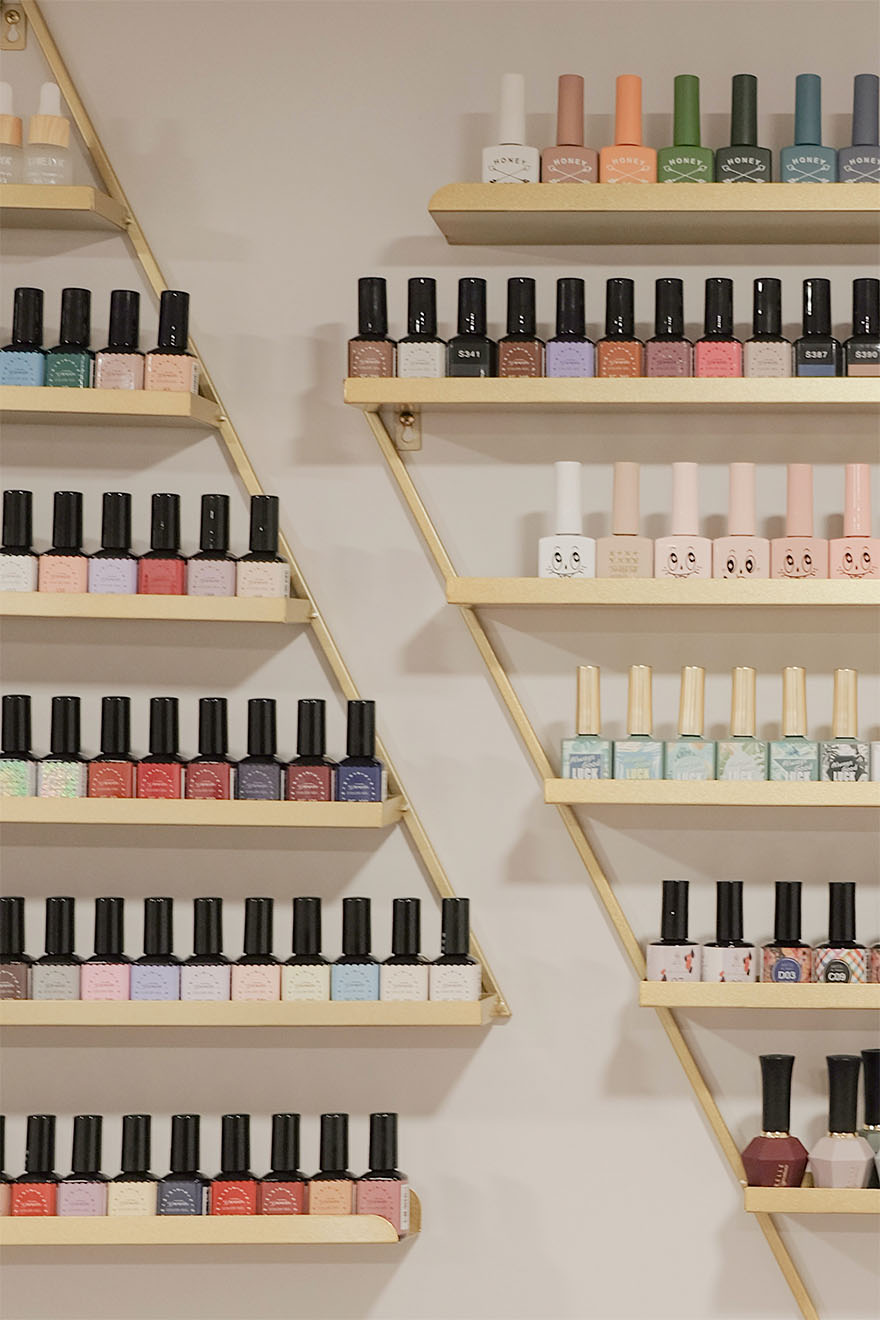 Nail varnish stacked on shelves