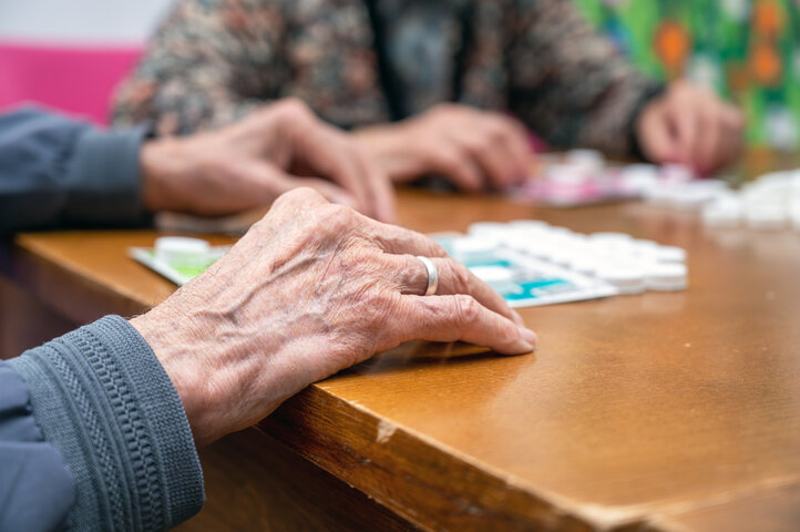 older person playing bingo in a care home