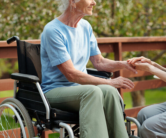 cropped image of a woman in a wheelchair