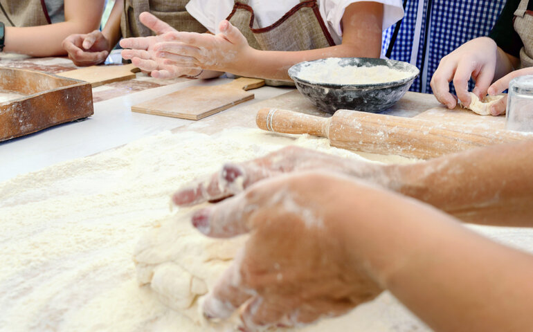 students and residents baking together