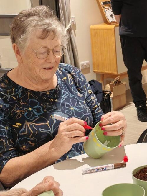 resident with plant pot