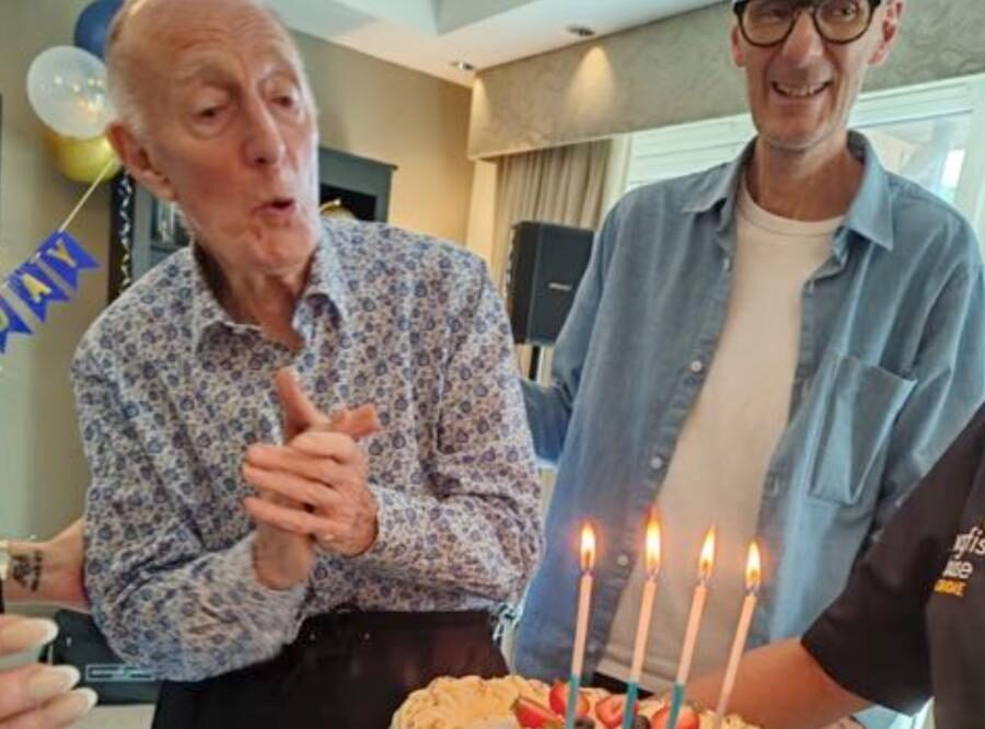 resident with cake
